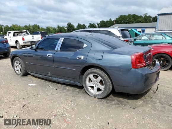 2008 Dodge Charger SXT с VIN 2B3KA33G18H275644, выставлен на аукционе Copart как лот 71127934 с пробегом 163 826 миль миль и Списание • Salvage title. История ставок и продаж доступна на DreamBid. Изображение 2.