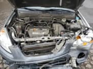 ✅ 2006 Honda CR-V EX • VIN: JHLRD788X6C055354 • Lot: 86170795. Wystawiony na Copart z przebiegiem 312 294 mil. Bezpłatny archiwum sprzedaży aukcyjnych z USA i szczegółowy raport historii pojazdu na DreamBid. Zdjęcie 11.