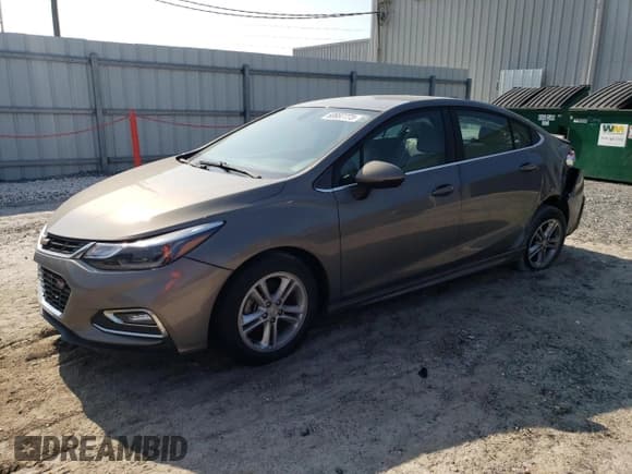 ✅ 2017 Chevrolet Cruze LT • VIN: 1G1BE5SM5H7280260 • Lot: 60887773. Listed on Copart with 77,048 mi. Free auction sales archive from the USA and detailed vehicle history report at DreamBid. Image 1.