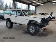 ✅ 1998 Jeep Cherokee Sport • VIN: 1J4FJ68S7WL169885 • Lot: 43792886. Listed on IAAI with 201,014 mi. Free auction sales archive from the USA and detailed vehicle history report at DreamBid. Image 1.