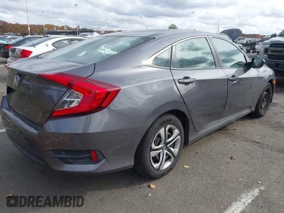 ✅ 2018 Honda Civic LX • VIN: 2HGFC2F51JH534526 • Lot: 43556014. Listed on IAAI with 84,549 mi. Free auction sales archive from the USA and detailed vehicle history report at DreamBid. Image 4.
