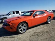 ✅ 2009 Dodge Challenger R/T • VIN: 2B3LJ54T59H511144 • Lot: 79312184. Wystawiony na Copart z przebiegiem 75 467 mil. Bezpłatny archiwum sprzedaży aukcyjnych z USA i szczegółowy raport historii pojazdu na DreamBid. Zdjęcie 1.