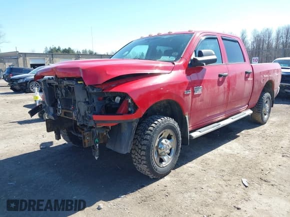 ✅ 2012 Ram 2500 ST • VIN: 3C6TD5CT6CG200358 • Lot: 41806692. Listed on IAAI with 143,390 mi. Free auction sales archive from the USA and detailed vehicle history report at DreamBid. Image 2.