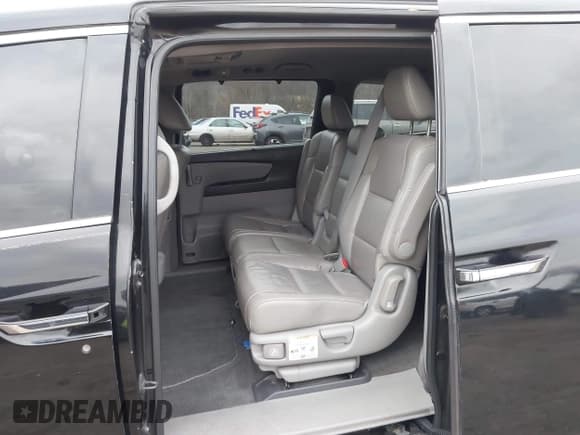 ✅ 2011 Honda Odyssey Touring • VIN: 5FNRL5H90BB014208 • Lot: 43682256. Listed on IAAI with 169,536 mi. Free auction sales archive from the USA and detailed vehicle history report at DreamBid. Image 8.