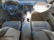 ✅ 2014 Jeep Grand Cherokee Overland • VIN: 1C4RJFCT9EC147999 • Lot: 89689645. Listed on Copart with 133,640 mi. Free auction sales archive from the USA and detailed vehicle history report at DreamBid. Image 8.