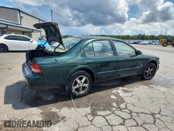 ✅ 1999 Nissan Maxima GXE • VIN: JN1CA21D3XT819488 • Lot: 63373135. Listed on Copart with 253,164 mi. Free auction sales archive from the USA and detailed vehicle history report at DreamBid. Image 3.