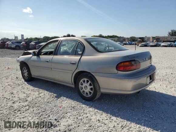 1997 Chevrolet Malibu LS z VIN 1G1NE52M0V6116879, wystawiony jako Copart lot #57306115 z przebiegiem Nie podano mil oraz Szkoda całkowita • Salvage title. Historia ofert i sprzedaży dostępna na DreamBid. Obrazek 2.