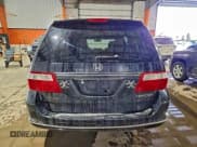 ✅ 2005 Honda Odyssey EX-L • VIN: 5FNRL38635B509212 • Lot: 94388545. Listed on Copart with 258,820 mi. Free auction sales archive from the USA and detailed vehicle history report at DreamBid. Image 6.