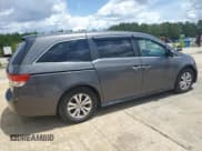 ✅ 2014 Honda Odyssey EX-L • VIN: 5FNRL5H65EB040989 • Lot: 60655755. Listed on Copart with 224,963 mi. Free auction sales archive from the USA and detailed vehicle history report at DreamBid. Image 3.