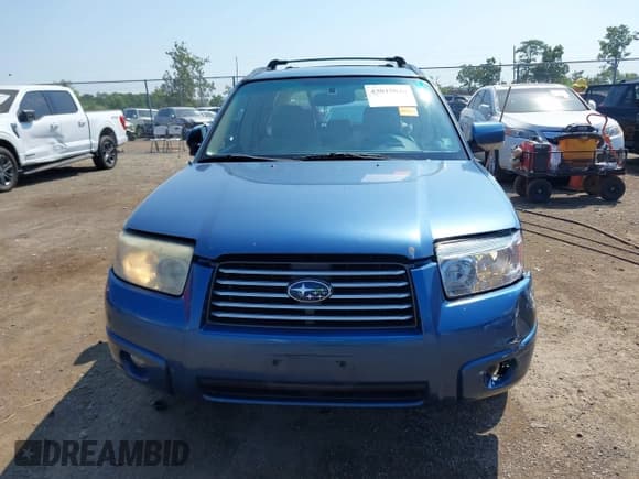 ✅ 2007 Subaru Forester X • VIN: JF1SG65687H711290 • Lot: 43015046. Listed on IAAI with 174,162 mi. Free auction sales archive from the USA and detailed vehicle history report at DreamBid. Image 12.