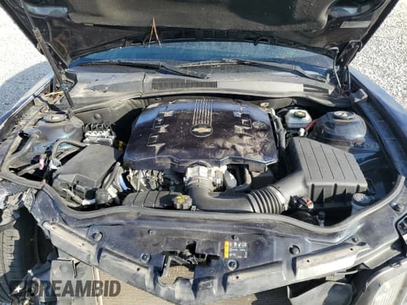 ✅ 2013 Chevrolet Camaro LS • VIN: 2G1FE1E33D9125938 • Лот: 91416635. Опубликован ранее на Copart с пробегом 141 224 миль. Бесплатный доступ к архиву аукционных продаж из США и подробный отчёт об истории автомобиля на DreamBid. Изображение 11.