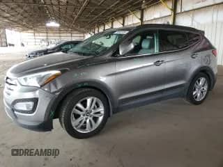 2013 Hyundai Santa Fe Sport z VIN 5XYZU3LA5DG117297, wystawiony jako Copart lot #70342135 z przebiegiem 136 447 mil mil oraz Szkoda całkowita • Salvage title. Historia ofert i sprzedaży dostępna na DreamBid. Obrazek 1.