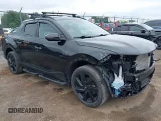 2023 Hyundai Santa Cruz Night Edition z VIN 5NTJCDAF0PH051549, wystawiony jako IAAI lot #42600260 z przebiegiem 37 876 mil mil oraz . Historia ofert i sprzedaży dostępna na DreamBid. Obrazek 1.