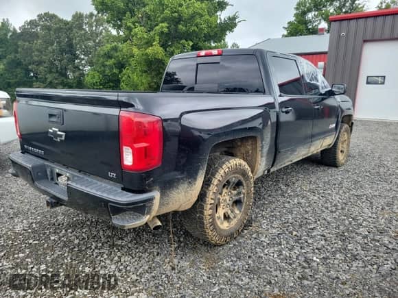 2017 Chevrolet Silverado 1500 LTZ with VIN 3GCUKSEJ1HG477844, listed as a Copart auction lot 64993025 with 147,904 mi miles and Salvage title. Bid and sale history available at DreamBid. Image 4.