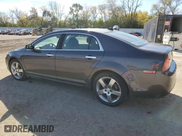 ✅ 2012 Chevrolet Malibu 1LT • VIN: 1G1ZC5E02CF252721 • Lot: 76123524. Listed on Copart with 128,087 mi. Free auction sales archive from the USA and detailed vehicle history report at DreamBid. Image 2.