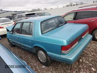 ✅ 1992 Plymouth Acclaim • VIN: 1P3XA4631NF248220 • Lot: 84113754. Wystawiony na Copart z przebiegiem 117 489 mil. Bezpłatny archiwum sprzedaży aukcyjnych z USA i szczegółowy raport historii pojazdu na DreamBid. Zdjęcie 2.