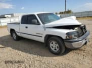 ✅ 1999 Dodge 1500 • VIN: 3B7HC12Y2XG100089 • Lot: 80316435. Listed on Copart with 263,356 mi. Free auction sales archive from the USA and detailed vehicle history report at DreamBid. Image 4.