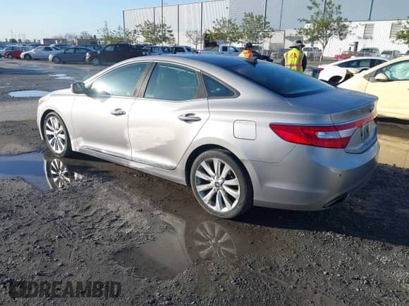 ✅ 2013 Hyundai Azera • VIN: KMHFH4JG3DA230844 • Lot: 41817997. Wystawiony na IAAI z przebiegiem 129 163 mil mil. Skorzystaj z bezpłatnego archiwum sprzedaży aukcyjnych z USA i zobacz szczegółowy raport historii pojazdu na DreamBid. Zdjęcie 3.