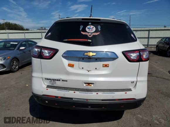 2017 Chevrolet Traverse LT z VIN 1GNKVHKD3HJ205110, wystawiony jako Copart lot #80302505 z przebiegiem 34 534 mil mil oraz Szkoda całkowita • Salvage title. Historia ofert i sprzedaży dostępna na DreamBid. Obrazek 6.
