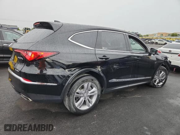 ✅ 2023 Acura MDX • VIN: 5J8YE1H35PL028041 • Лот: 81455915. Опубликован ранее на Copart с пробегом 63 715 миль. Бесплатный доступ к архиву аукционных продаж из США и подробный отчёт об истории автомобиля на DreamBid. Изображение 3.