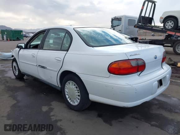 2003 Chevrolet Malibu z VIN 1G1ND52J63M580342, wystawiony jako IAAI lot #41275300 z przebiegiem 156 346 mil mil oraz . Historia ofert i sprzedaży dostępna na DreamBid. Obrazek 3.
