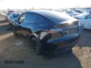 ✅ 2023 Tesla Model Y Long Range • VIN: 7SAYGDEE0PF907260 • Lot: 41180227. Listed on IAAI with Not provided. Free auction sales archive from the USA and detailed vehicle history report at DreamBid. Image 3.