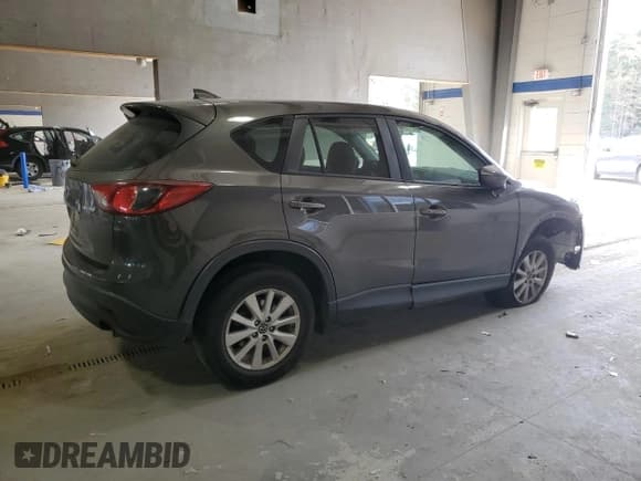 ✅ 2016 Mazda CX-5 Touring • VIN: JM3KE4CYXG0713069 • Lot: 82329005. Wystawiony na Copart z przebiegiem 135 308 mil. Bezpłatny archiwum sprzedaży aukcyjnych z USA i szczegółowy raport historii pojazdu na DreamBid. Zdjęcie 3.