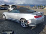 ✅ 2018 Chevrolet Camaro 1LT • VIN: 1G1FB3DX6J0126838 • Lot: 41682004. Listed on IAAI with 65,957 mi. Free auction sales archive from the USA and detailed vehicle history report at DreamBid. Image 3.