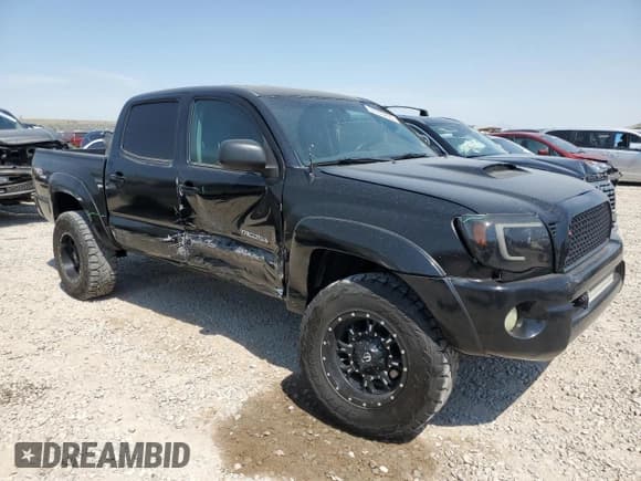 ✅ 2011 Toyota Tacoma • VIN: 5TFLU4EN7BX014761 • Lot: 57703435. Listed on Copart with 196,411 mi. Free auction sales archive from the USA and detailed vehicle history report at DreamBid. Image 4.
