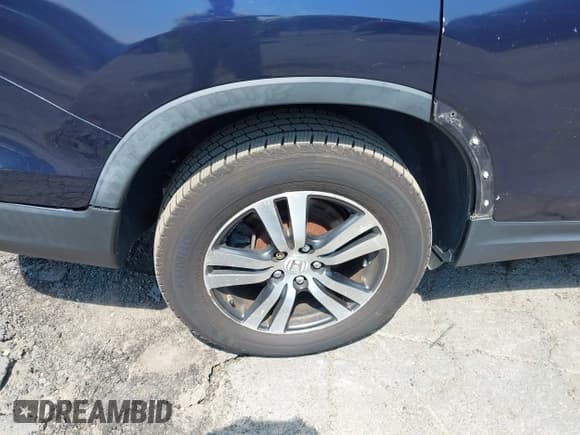 ✅ 2018 Honda Pilot EX-L • VIN: 5FNYF6H5XJB013698 • Lot: 42986201. Listed on IAAI with 63,873 mi. Free auction sales archive from the USA and detailed vehicle history report at DreamBid. Image 13.