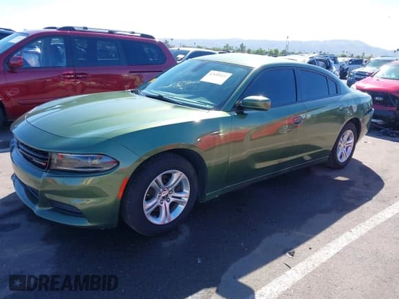 ✅ 2022 Dodge Charger SXT • VIN: 2C3CDXBG1NH138867 • Lot: 43454424. Listed on IAAI with 39,320 mi. Free auction sales archive from the USA and detailed vehicle history report at DreamBid. Image 2.