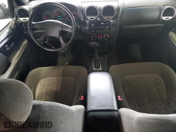 ✅ 2004 GMC Envoy SLE • VIN: 1GKDT13S342140960 • Лот: 68049835. Опубликован ранее на Copart с пробегом 287 399 миль. Бесплатный доступ к архиву аукционных продаж из США и подробный отчёт об истории автомобиля на DreamBid. Изображение 8.