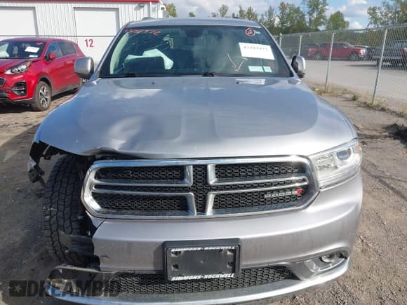 ✅ 2018 Dodge Durango SXT • VIN: 1C4RDJAG5JC176264 • Lot: 43283972. Listed on IAAI with 141,830 mi. Free auction sales archive from the USA and detailed vehicle history report at DreamBid. Image 12.