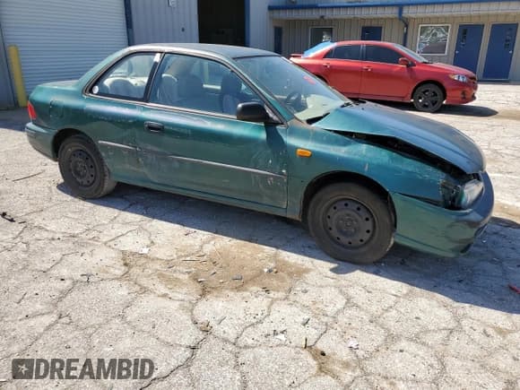 ✅ 1997 Subaru Impreza • VIN: JF1GM4255VH401478 • Lot: 56221515. Listed on Copart with 75,202 mi. Free auction sales archive from the USA and detailed vehicle history report at DreamBid. Image 4.