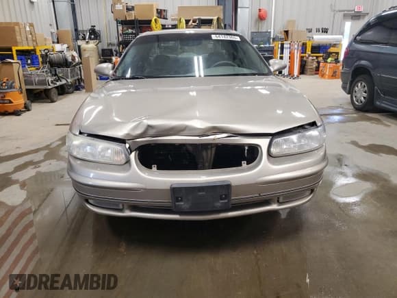 ✅ 2003 Buick Regal LS • VIN: 2G4WB52K931204753 • Lot: 64142365. Listed on Copart with 118,581 mi. Free auction sales archive from the USA and detailed vehicle history report at DreamBid. Image 5.