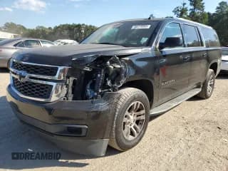 ✅ 2016 Chevrolet Suburban LT • VIN: 1GNSCHKC1GR432728 • Lot: 86419565. Listed on Copart with 187,216 mi. Free auction sales archive from the USA and detailed vehicle history report at DreamBid. Image 1.