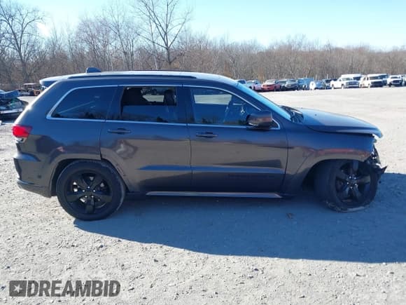 ✅ 2015 Jeep Grand Cherokee Overland • VIN: 1C4RJFCGXFC215750 • Лот: 40795135. Опубликован ранее на IAAI с пробегом 89 110 миль. Бесплатный доступ к архиву аукционных продаж из США и подробный отчёт об истории автомобиля на DreamBid. Изображение 13.