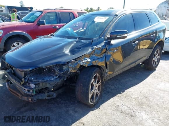 ✅ 2015 Volvo XC60 T6 • VIN: YV4902RK8F2665181 • Lot: 43589471. Listed on IAAI with 49,909 mi. Free auction sales archive from the USA and detailed vehicle history report at DreamBid. Image 2.