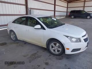 ✅ 2014 Chevrolet Cruze 1LT • VIN: 1G1PC5SB0E7307970 • Lot: 43443821. Listed on IAAI with 177,010 mi. Free auction sales archive from the USA and detailed vehicle history report at DreamBid. Image 1.