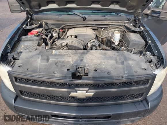 2011 Chevrolet Silverado 1500 Work Truck z VIN 1GCRKPEA4BZ201510, wystawiony jako IAAI lot #43253547 z przebiegiem 189 665 mil mil oraz . Historia ofert i sprzedaży dostępna na DreamBid. Obrazek 10.