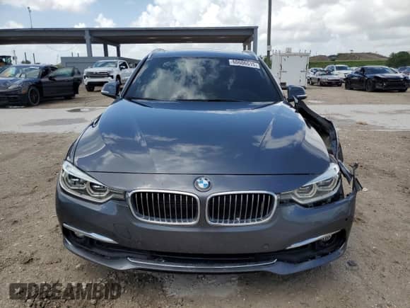2018 BMW 3 Series 328d xDrive с VIN WBA8J1C51JA379516, выставлен на аукционе Copart как лот 60606515 с пробегом 69 578 миль миль и Списание • Salvage title. История ставок и продаж доступна на DreamBid. Изображение 5.