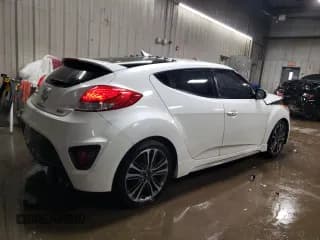 ✅ 2016 Hyundai Veloster Turbo • VIN: KMHTC6AE9GU283479 • Lot: 84070254. Wystawiony na Copart z przebiegiem 94 944 mil. Bezpłatny archiwum sprzedaży aukcyjnych z USA i szczegółowy raport historii pojazdu na DreamBid. Zdjęcie 3.
