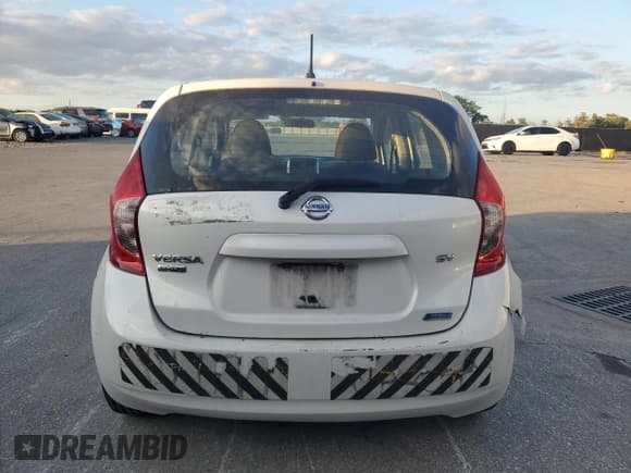 ✅ 2014 Nissan Note S • VIN: 3N1CE2CP7EL424016 • Лот: 90047315. Опубликован ранее на Copart с пробегом 130 506 миль. Бесплатный доступ к архиву аукционных продаж из США и подробный отчёт об истории автомобиля на DreamBid. Изображение 6.