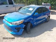 ✅ 2023 Kia Rio S • VIN: 3KPA24AD6PE557598 • Lot: 43250605. Listed on IAAI with 33,426 mi. Free auction sales archive from the USA and detailed vehicle history report at DreamBid. Image 2.