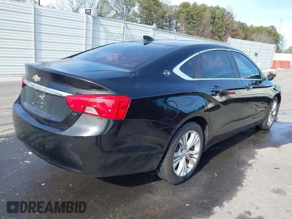 ✅ 2015 Chevrolet Impala LT • VIN: 1G1125S39FU108498 • Lot: 43814413. Listed on IAAI with 218,284 mi. Free auction sales archive from the USA and detailed vehicle history report at DreamBid. Image 4.
