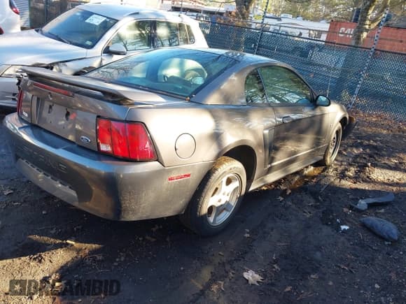✅ 2003 Ford Mustang Standard • VIN: 1FAFP40483F364612 • Lot: 43916345. Listed on IAAI with 83,581 mi. Free auction sales archive from the USA and detailed vehicle history report at DreamBid. Image 4.