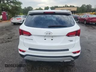 ✅ 2018 Hyundai Santa Fe 2.4L • VIN: 5NMZUDLB2JH101462 • Лот: 84201535. Опубликован ранее на Copart с пробегом 183 614 миль. Бесплатный доступ к архиву аукционных продаж из США и подробный отчёт об истории автомобиля на DreamBid. Изображение 6.