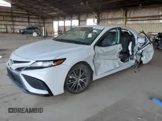 2022 Toyota Camry SE с VIN 4T1S11AKXNU055336, выставлен на аукционе Copart как лот 70786395 с пробегом 63 005 миль миль и Списание • Salvage title. История ставок и продаж доступна на DreamBid. Изображение 1.
