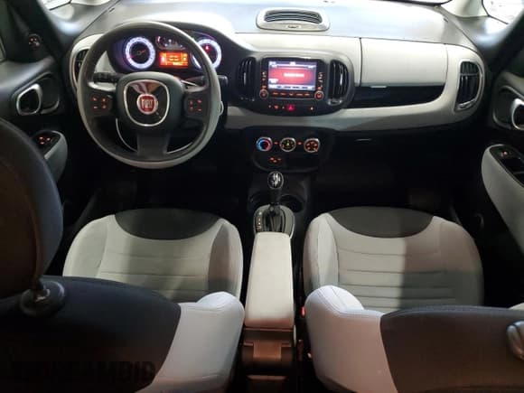 ✅ 2014 FIAT 500L Easy • VIN: ZFBCFABH1EZ025922 • Lot: 54549505. Listed on Copart with 54,331 mi. Free auction sales archive from the USA and detailed vehicle history report at DreamBid. Image 8.