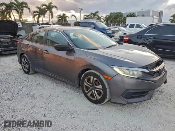 ✅ 2017 Honda Civic LX • VIN: 19XFC2F59HE017124 • Lot: 94428665. Wystawiony na Copart z przebiegiem 141 765 mil. Bezpłatny archiwum sprzedaży aukcyjnych z USA i szczegółowy raport historii pojazdu na DreamBid. Zdjęcie 4.